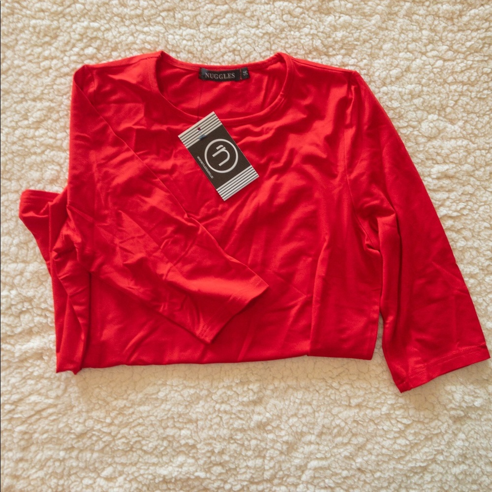 Size 14 • girls nuggles shirt •